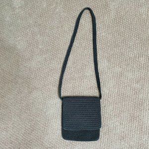 A Classic The Sak Gray Crocheted Shoulder Bag.